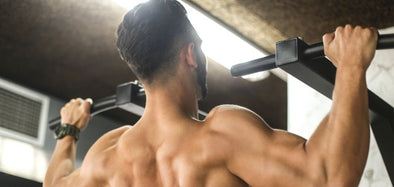 man showing back muscles from doing pull up